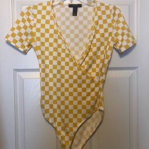 Never worn short sleeve checkered Bodysuit